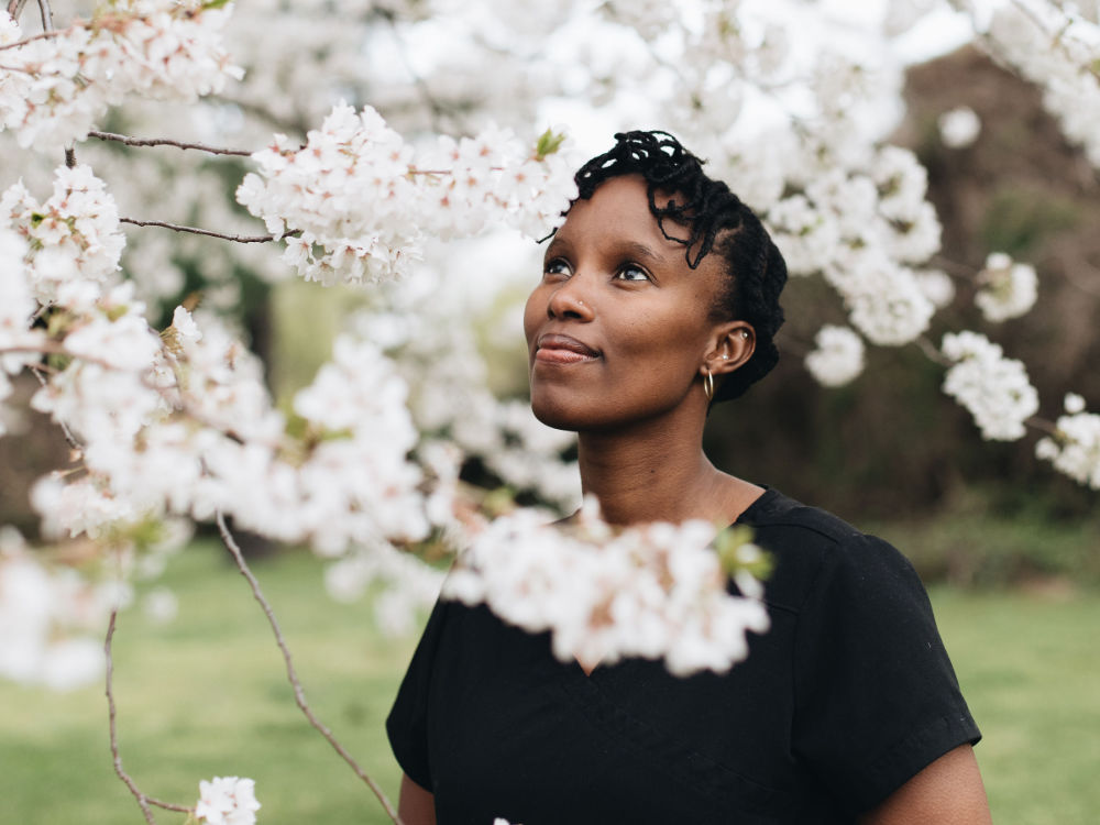 Woman gazing at Cherry Blossom's